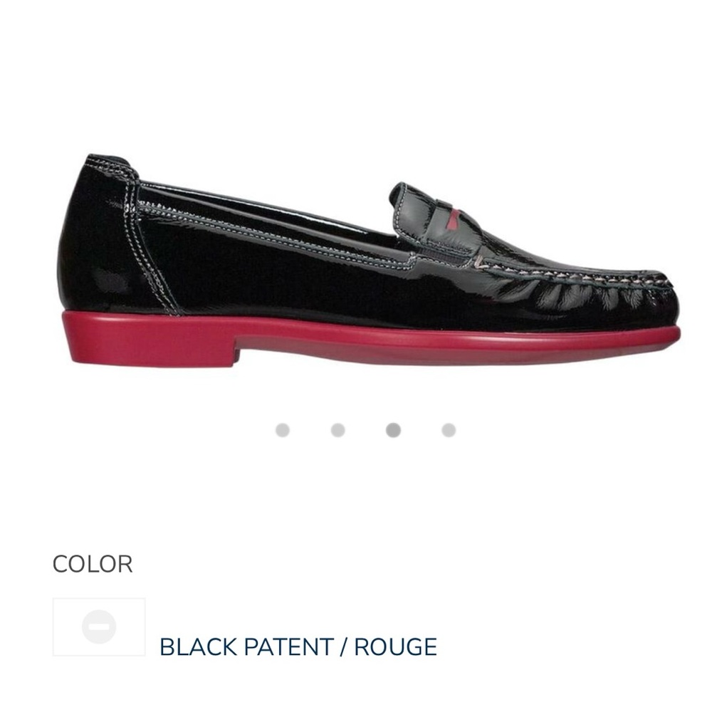 SAS Black patent leather loafers with red accent and red sole.
MADE IN THE USA